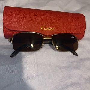 Gold rim Cartier glasses